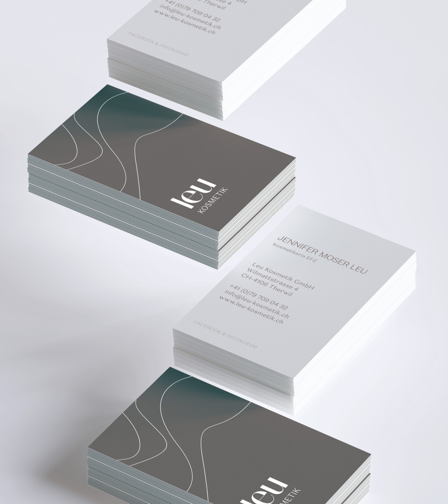Visitenkarten mit Logo und Grafik-Element gestaltet von Grafikdesign Cueni Basel.